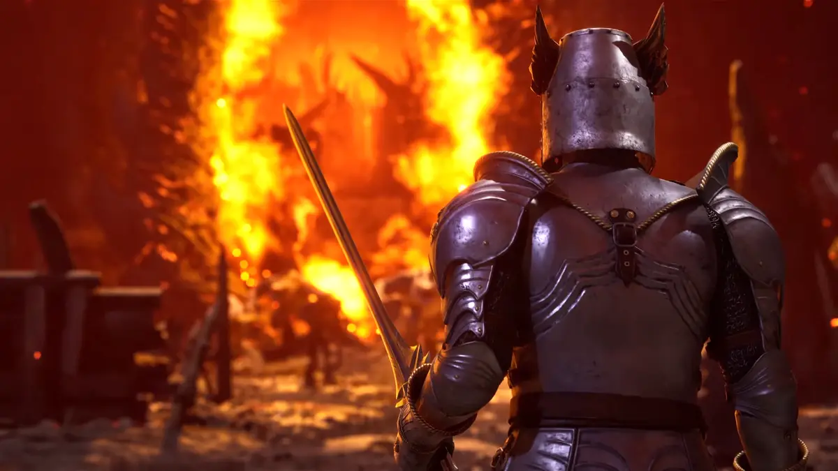 Gaming World News: A knight in detailed silver armour faces a blazing Oblivion gate, showcasing the fiery visual effects in Oblivion Remastered.