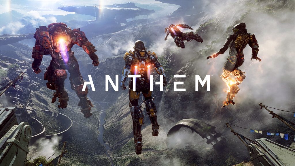Gaming World News: Four Anthem exosuit pilots soaring over a vast, lush open-world environment with mountains and rivers in the distance.