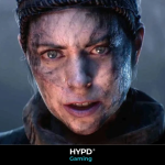 Intense close-up of Senua’s face in Hellblade II, showing dirt, scars, and emotion in a cinematic moment