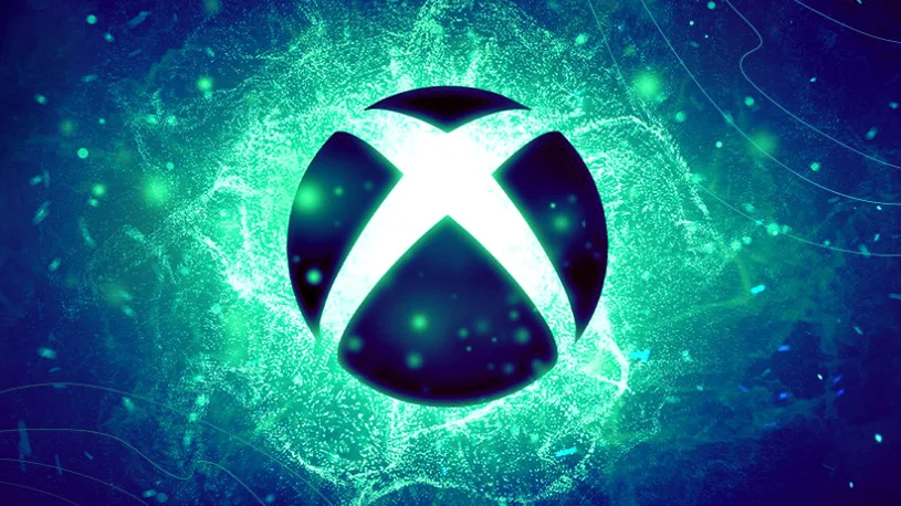 Glowing neon Xbox logo surrounded by vibrant electric energy effects on a blue–green background.