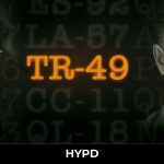 TR-49 review cover image showing two characters facing each other with glowing TR-49 title, representing the game’s tactical sci-fi tone