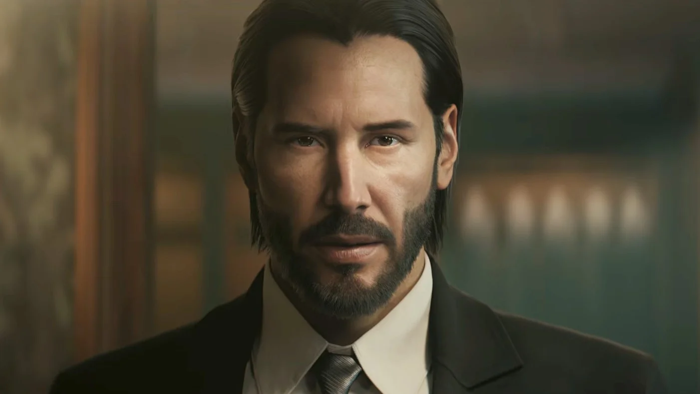 Close-up of John Wick in a black suit and tie from the upcoming AAA John Wick video game, showing detailed facial features and cinematic lighting