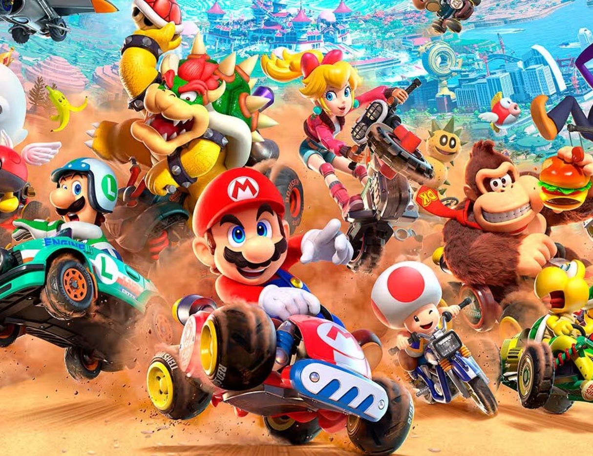Mario Kart World characters including Mario, Bowser, Princess Peach and Donkey Kong racing in a colourful, action-packed multiplayer scene
