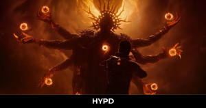 Player faces a massive multi-armed cosmic creature surrounded by glowing energy orbs in Saros boss fight scene
