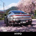 Silver Porsche driving through cherry blossom-covered Japanese mountain roads in Forza Horizon 6 with Mount Fuji in the background.