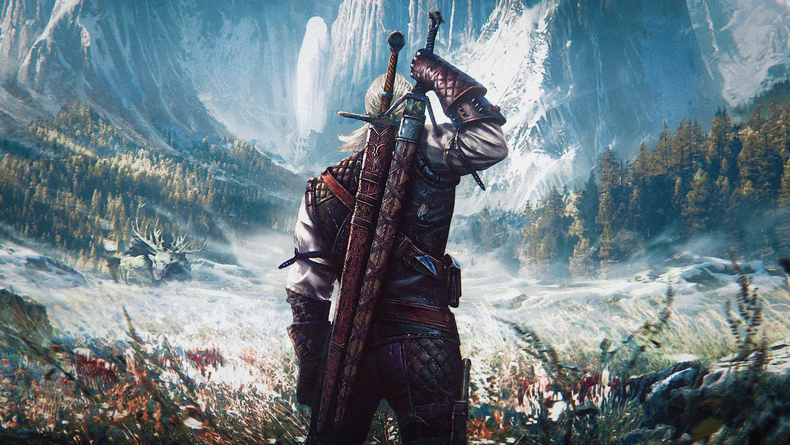 Promotional artwork from The Witcher 3: Wild Hunt featuring Geralt of Rivia overlooking a vast fantasy landscape as the game reaches a major sales milestone.