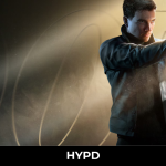 Promotional artwork for 007 First Light featuring a young James Bond aiming a pistol against a stylish backdrop with the iconic 007 logo, highlighting IO Interactive's new spy action adventure.