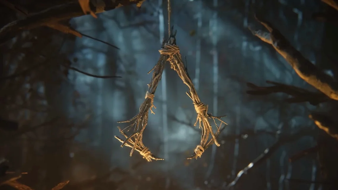 Wooden Assassin's Creed symbol hanging in a dark forest from the teaser for Assassin's Creed Hexe.