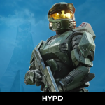 Master Chief standing in front of the Halo ring in Halo: Campaign Evolved, showcasing the game's updated visuals and iconic sci-fi setting.