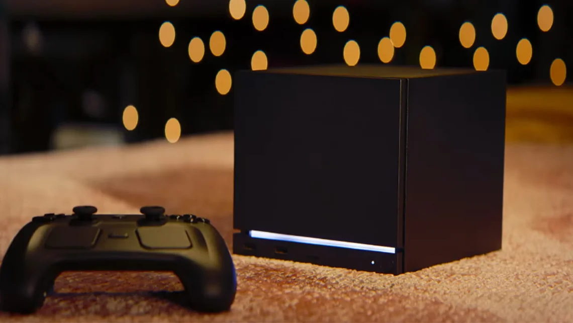 A Steam Machine gaming console with its controller, highlighting the first wave of shipments as Valve begins delivering the long-awaited hardware to customers.