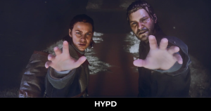 Dylan and Jesse Faden reaching forward in a dark supernatural scene from Control Resonant.