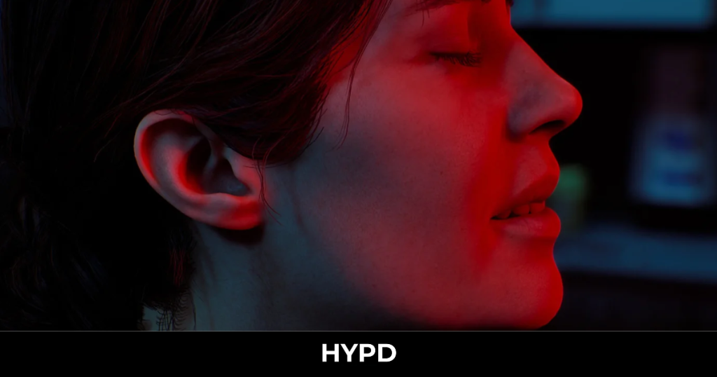Silent Hill: Townfall character illuminated by an intense red light in a dark and atmospheric scene.