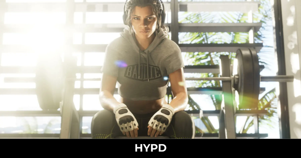 Lucia from GTA 6 sitting in a gym wearing boxing gloves and workout clothing, featured in the latest Grand Theft Auto 6 leaks coverage.