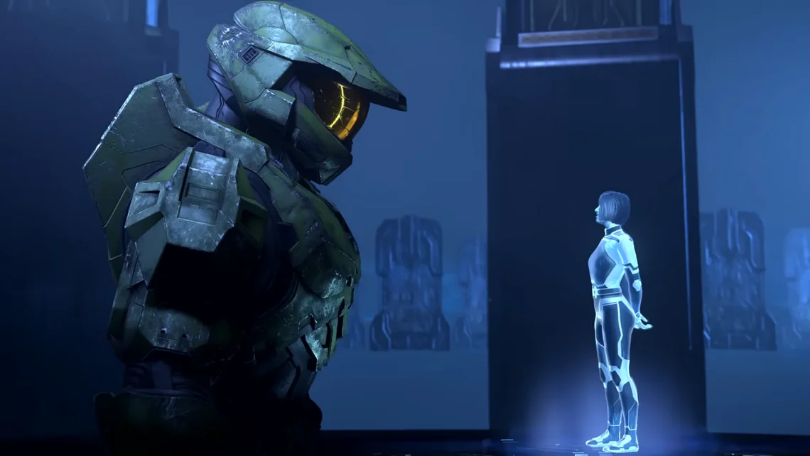 Master Chief stands beside Cortana in a scene from Halo Infinite
